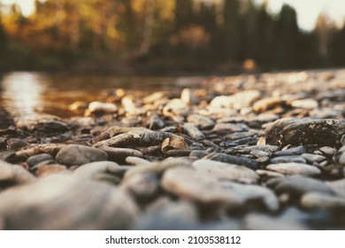 empty rocky riverbank close up. selective focus