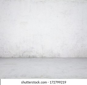empty room with concrete wall, grey background - Shutterstock ID 172799219