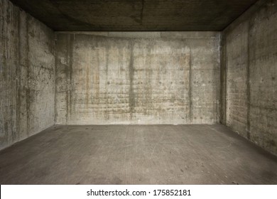 Empty room with concrete walls and floor.