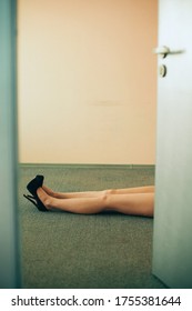 Empty Room With Door Wide Open And Legs Of Woman On Murder,Crime Scene Imitation. Legs Of The Lifeless Woman.,Legs With Copy Space For Text And Idea