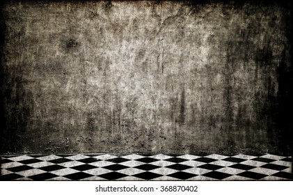 Empty room with white wall, tile floor.
