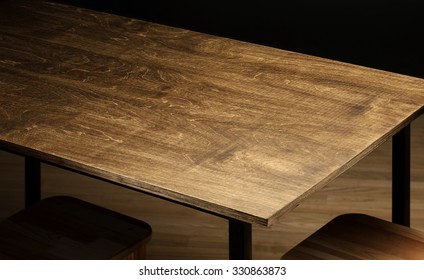 Empty Rough Wooden Table Top In The Dark Room