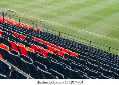 An Empty Rows Of Plastic Seats In Football Stadium. Stadium Seating Is A Seating Arrangement In Stadiums Where The Subject Matter Is Typically Best Observed From Above.