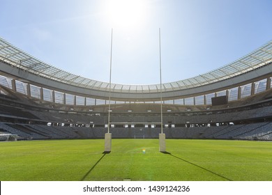 Empty Rugby goal post on a sunny day in the stadium - Powered by Shutterstock