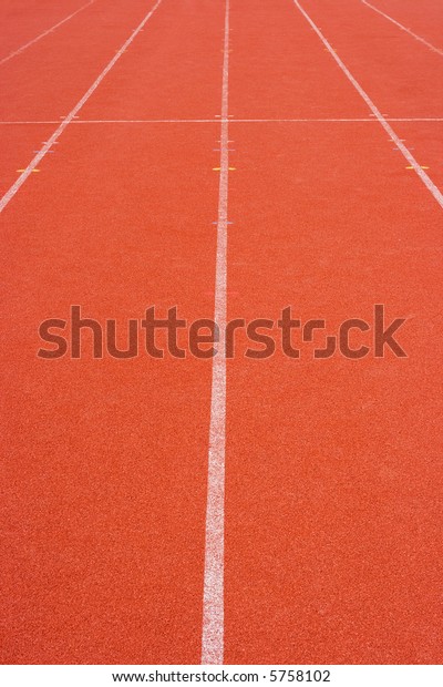 Empty running track in\
perspective