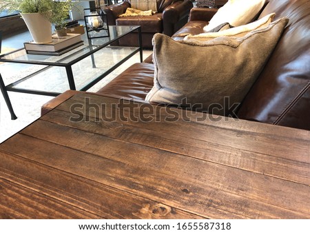 Empty rustic or vintage wooden table top corner in living room of the background