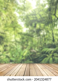 Empty Rustic Wood With Jungle Background Blurred. Ready For Put Your Product Display And Shelf Montage Concept With Copy Space. Wooden Stage For Objects Presentation In The Rainforest.