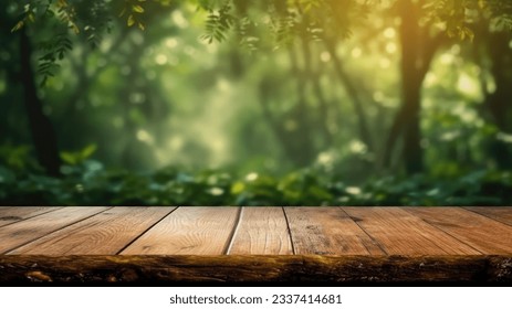 The empty rustic wooden plank table top with blur background of jungle. Exuberant image.