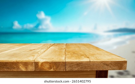 Empty rustic wooden table with copy space on sandy beach and sea and sky background. The image captures the essence of sunny summer day by the coast, evoking feelings of relaxation and calmness.