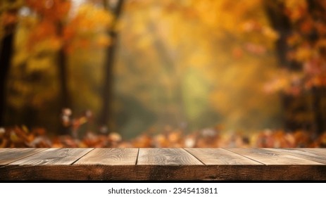 The empty rustic wooden table for product display with blur background of autumn forest. Exuberant image. - Powered by Shutterstock