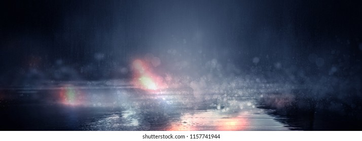 Empty scene of a show with lanterns and concrete floor, blue abstract background with bokeh, lights, rays. Wet asphalt with reflection of lights, rain. Blurred Background