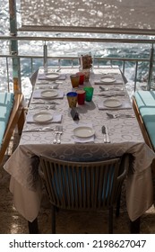 Empty Seaside Restaurant Table During Summer