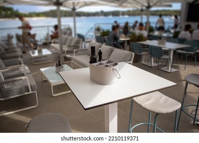 Empty Seaside Restaurant Table During Summer