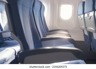 Empty seat on airplane while covid-19 outbreak destroy travel and airline business, health care and travel concept. - Shutterstock ID 2196205575