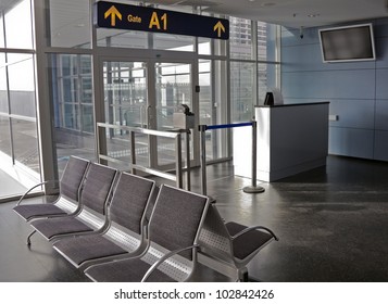 Empty Seating At Boarding Gate At An Airport