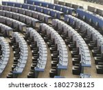 Empty seats in conference hall . blue chairs in european parliament building of european union in strasbourg france 