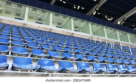 Empty seats grandstand in the football stadium background. - Powered by Shutterstock