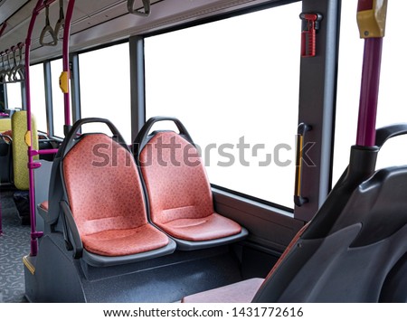 Empty seats of interior public bus in Singapore with white background