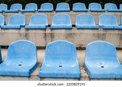 Empty Seats In An Old Football Stadium.