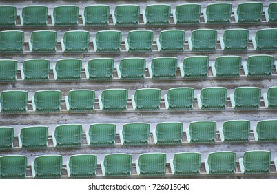 empty seats in rows, in the stadium
