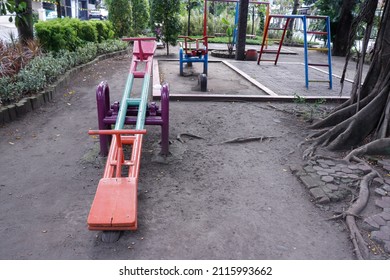 Empty Seesaw On Playground In Public Park. Playground For Kids.