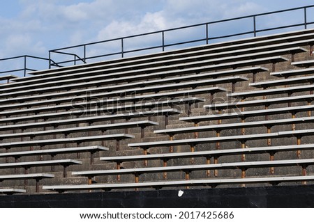 An empty set of bleachers at a school