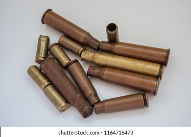 Empty shells from live ammunition to machine gun and pistol.