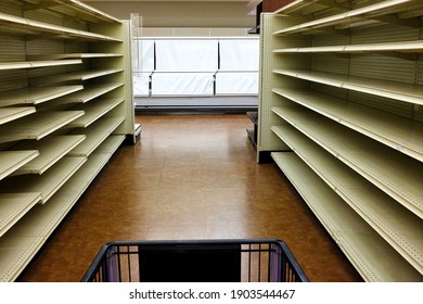 Empty Shelves In A Grocery Store During The Covid-19 Crisis.