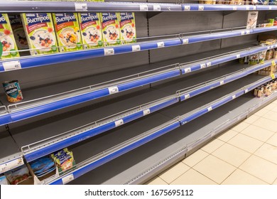 Empty Shelves In The Shop. Deficit Of Cereals And Rice Due To Excessive Demand During The Epidemic Of Coronavirus COVID-19. Russia, Moscow, March 17, 2020