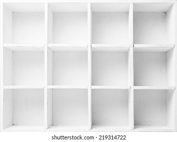 Empty Shelves In The White Wooden Rack