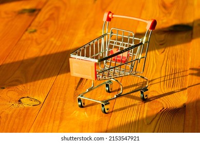 Empty Shopping Cart. Concept For Shopping Day. Day Of Discounts For The Best Purchases. Trolley And Buggy For Best Shopping In Store. Wheeled Cart For Shop. Close-up. Inscription And Advertising