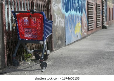 Empty Shopping Cart On A Street In Bucharest City Center.