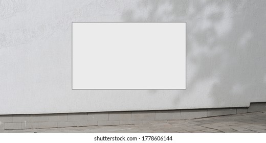 Empty Sign With Mock-up White Colour Hanging On Concrete Building Wall With Shadow Over Sidewalk Outside At City Street Commercial Advertising Concept