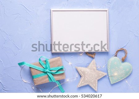 Similar – Image, Stock Photo turquoise and silver stars hang as decoration on a white paper bag