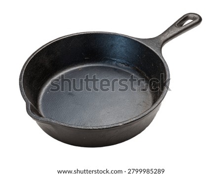 An empty small black mini cast iron skillet pan with a single handle, as seen in ultra-realistic-mini-cast-iron-skillet-isolated-on.jpg. This durable commercial kitchen cookware asset is isolated on a clean transparent background for versatile culinary designs.