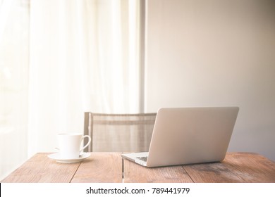 Empty Small Breakfast Table With Laptop On It.  Wooden Table. Taken Outdoor. Mobile Office Concept. Negative Space And Copy Space.