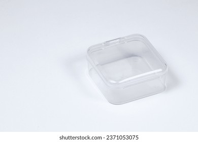 Empty small transparent plastic box isolated on white background.