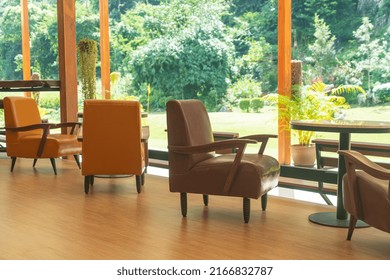 Empty Sofa Chair With Table On Balcony With Mountain Hill Background