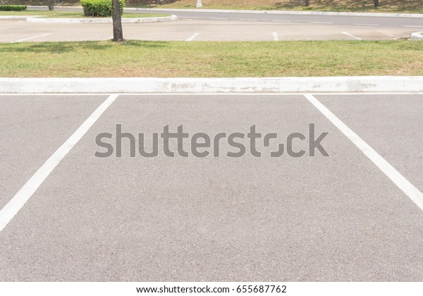 Empty Space in a Parking Lot / Empty space parking\
lot outdoor in public\
park.