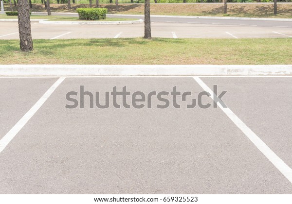 Empty Space in a Parking Lot / Empty space parking\
lot outdoor in public\
park.