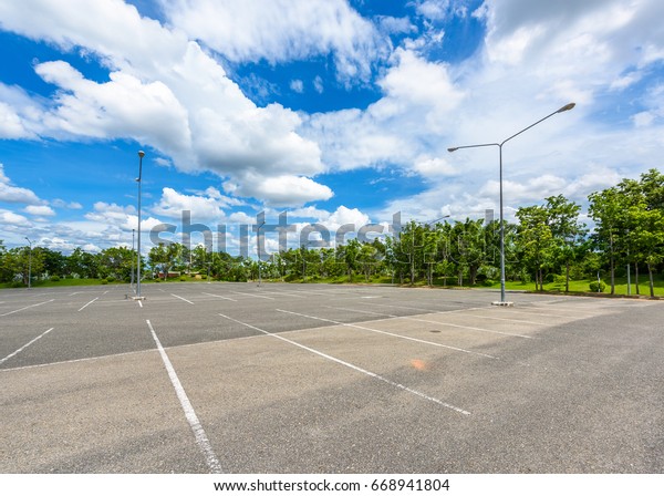 Empty space\
parking lot outdoor in public\
park.
