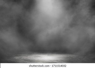 Empty space studio dark room with spot lighting and fog in black background.  - Shutterstock ID 1711514032