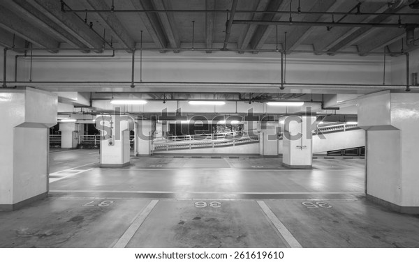 Empty\
space of underground car parking at night\
time
