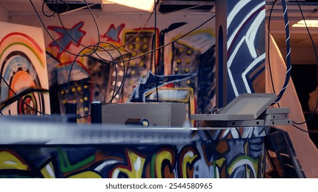 Empty spray paint cans left over in old degraded building by urban explorers venturing into abandoned structures. Property damage done by urbex hobbyists in vandalized place with scattered debris - Powered by Shutterstock