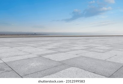 Empty square and cityscape skyline
