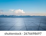 Empty square floor and beautiful mountain natural landscape under blue sky 