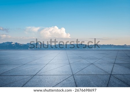 Empty square floor and beautiful mountain natural landscape under blue sky 