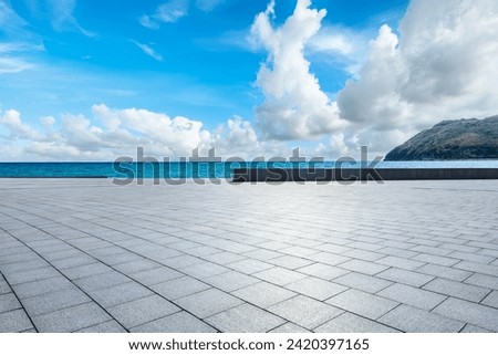 Empty square floor and blue sea with island nature landscape under blue sky