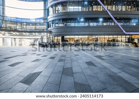 Empty square floor and city glass building landscape