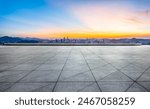 Empty square floor and city skyline with mountain scenery in Shenzhen